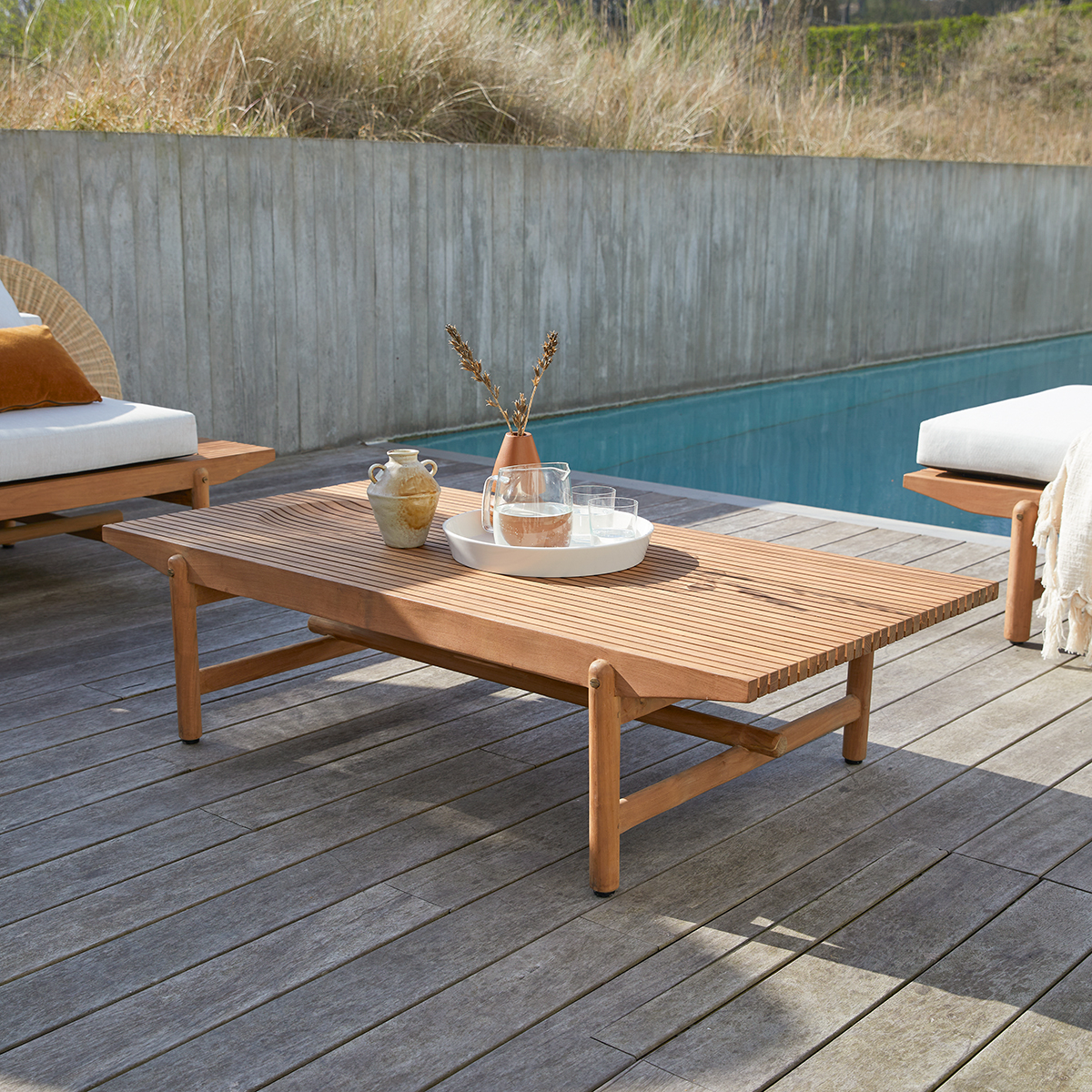 Solid slatted teak garden coffee table Garden furniture Tikamoon